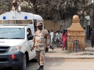 Rangers stand guard outside a temple in Site on Friday. PHOTO: INP