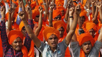 Supporters of the Hindu nationalist Narendra Modi voice their support for him as the prime ministerial candidate for the BJP, at a rally in the Gujarati city of Ahmedabad. Photo: Reuters.