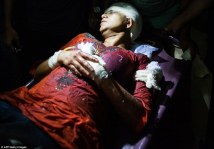 2624657800000578-2971508-Survivor_Rafida_Ahmed_is_pictured_above_being_stretchered_to_hos-a-56_1425059963361