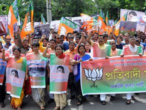 SAFFRON UPSURGE: The Assam unit of the BJP taking out a rally towards Raj Bhawan in Guwahati on Tuesday, protesting against misrule of Congress government in the State. (Sentinel)