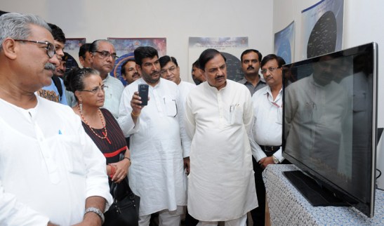 The Minister of State for Culture (Independent Charge), Tourism (Independent Charge) and Civil Aviation, Dr. Mahesh Sharma visiting the Unique Exhibition on Cultural Continuity from Rigveda to Robotics, in New Delhi on September 17, 2015. The President, CICD, Dr. Sonal Mansingh is also seen.