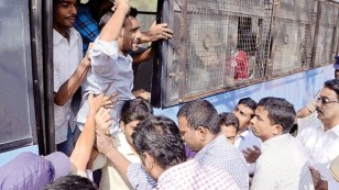 Police arresting students as they took out a rally in support of Beef Festival at Osmania University Campus in Hyderabad on Monday. Courtersy:  Express Photo.