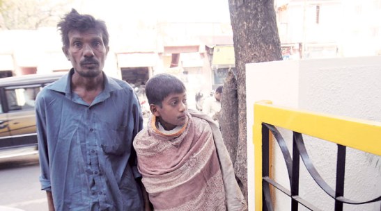 Savan Rathod’s father and brother in Pune. (Source: Arul Horizon).
