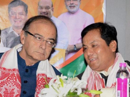 Union Finance Minister Arun Jaitley and BJP’s CM candidate Sarbananda Sonowal during the release of Assam Vision Document in Guwahati on Friday. Pic. PTI.