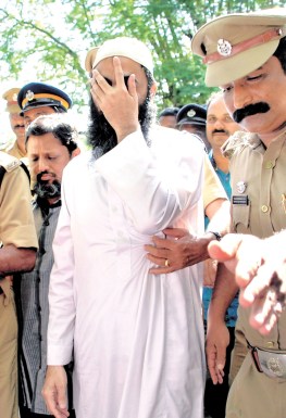 Arshi Qureshi and Rizwan Khan, who were arrested for their alleged link with the terror outfit Islamic State, being brought to the court in Ernakulam on Monday | K SHIJITH- Express Photo.