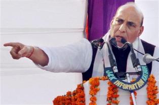 Union home minister Rajnath Singh addresses during a function to honour the families of martyrs of security forces at Kathua, 80 km from Jammu on Sunday. Photo: PTI.